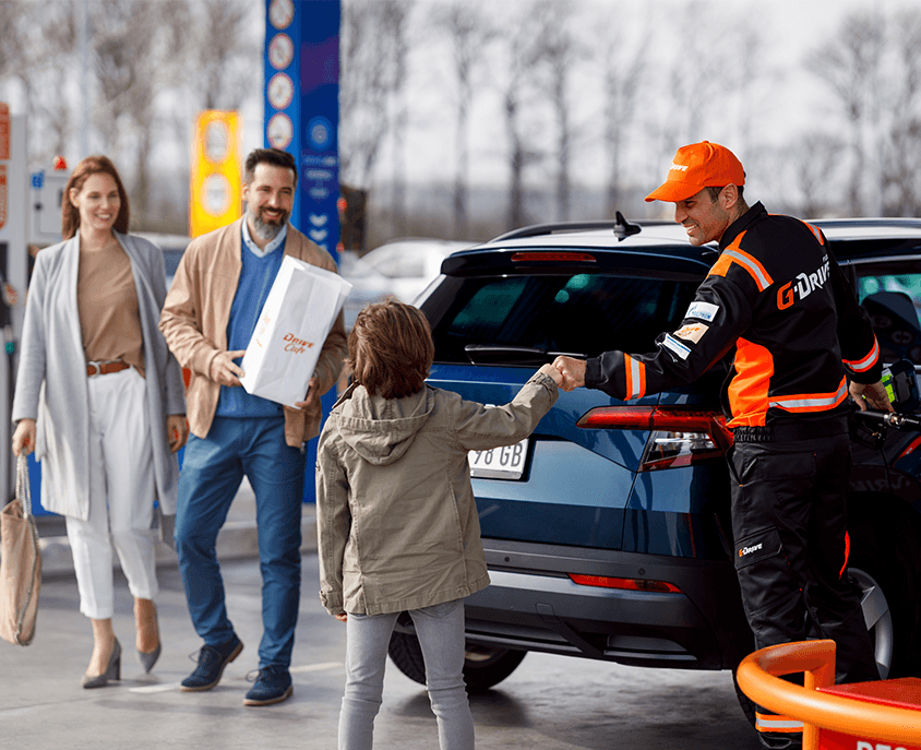 family at the petrol station